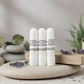 Three nasal aromatherapy sticks  on a spa stone