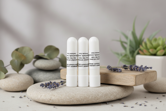 Three nasal aromatherapy sticks  on a spa stone
